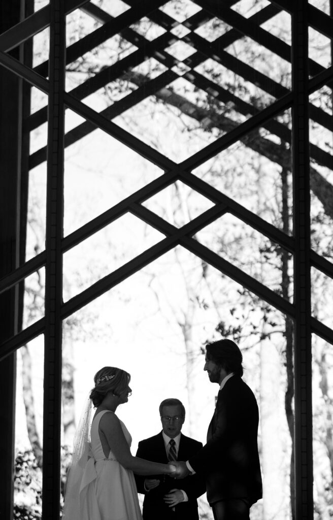 silhouette, Thorncrown Chapel, dramatic glass chapel wedding, Eureka Springs, Arkansas, destination wedding, unique wedding venue