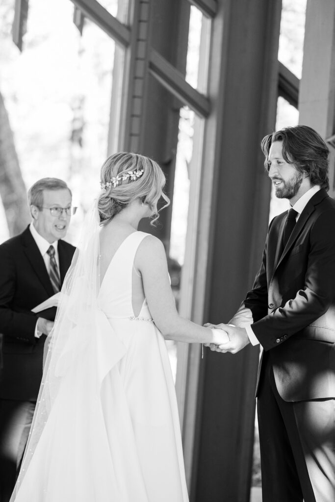 black and white wedding, Vow'd Weddings by Altar'd State hairpiece, Jenny Yoo NYC gown, Thorncrown Chapel, dramatic glass chapel wedding