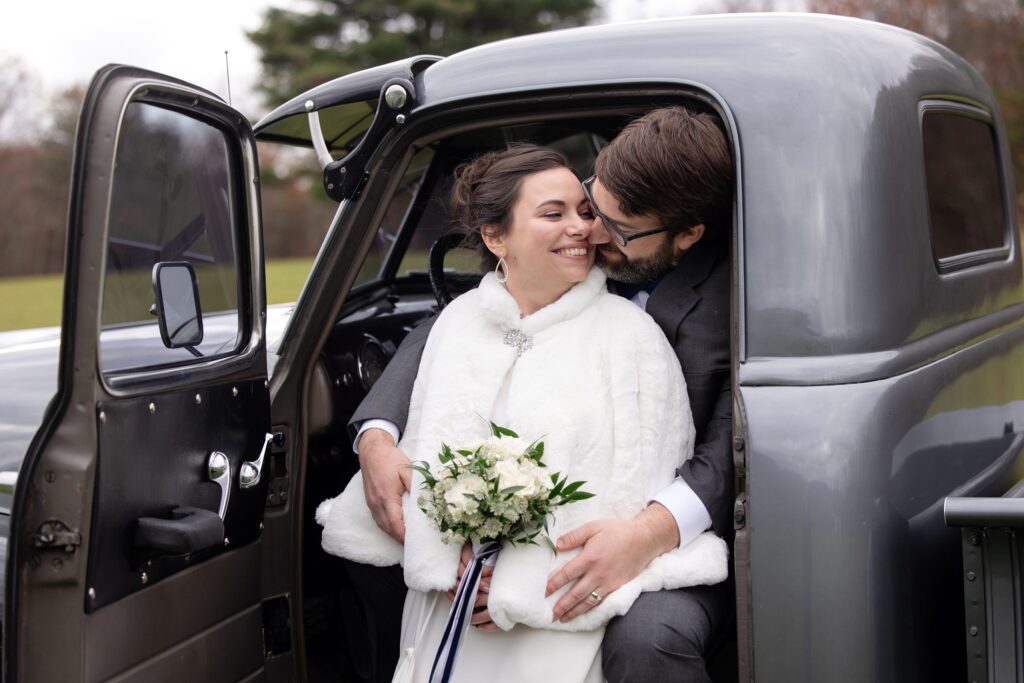 joyful new york wedding and answered prayers, bride and groom, antique chevy, pickup truck